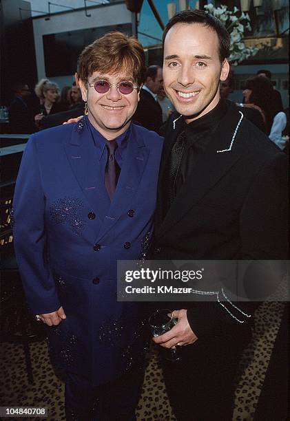 Elton John and David Furnish during The 71st Annual Academy Awards - Elton John AIDS Foundation Party at Pagani's in Los Angeles, California, United...