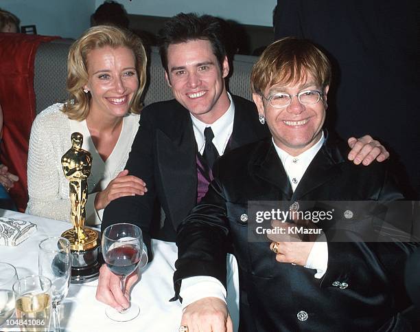 Jim Carrey, Emma Thompson and Elton John during The 68th Annual Academy Awards - Elton John AIDS Foundation Party in Los Angeles, California, United...