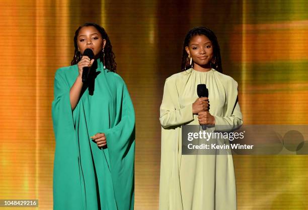 Chloe Bailey and Halle Bailey of Chloe x Halle speak onstage during the 2018 American Music Awards at Microsoft Theater on October 9, 2018 in Los...