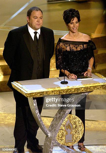 Mark Addy and Jami Gertz present the award for Favorite Reality-Based Show to "Survivor: Thailand" at the 29th Annual People's Choice Awards.