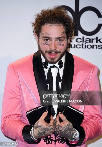 American Rapper Post US rapper Post Malone poses with his award for Favorite Male Artist ...