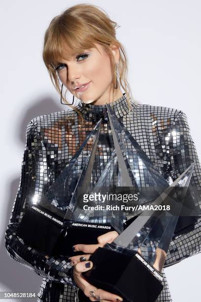 Taylor Swift poses for a portrait at the American Music Awards at Microsoft Theater on October 9, 2018 in Los Angeles, California.