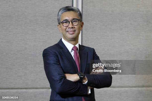 Tengku Zafrul Abdul Aziz, chief executive officer of CIMB Group Holdings Bhd., poses for a photograph after a Bloomberg Television interview at the...