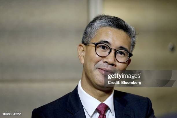 Tengku Zafrul Abdul Aziz, chief executive officer of CIMB Group Holdings Bhd., listens during a Bloomberg Television interview at the New Dawn...
