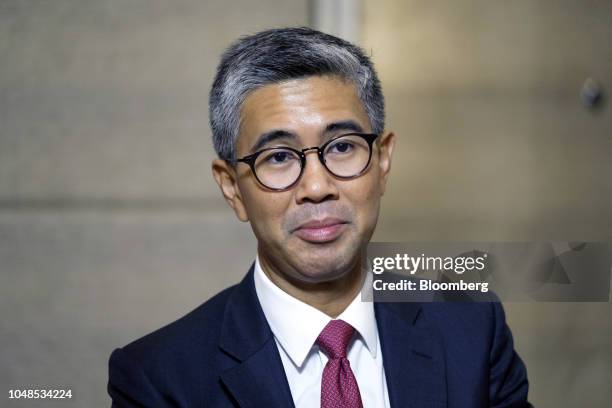 Tengku Zafrul Abdul Aziz, chief executive officer of CIMB Group Holdings Bhd., listens during a Bloomberg Television interview at the New Dawn...