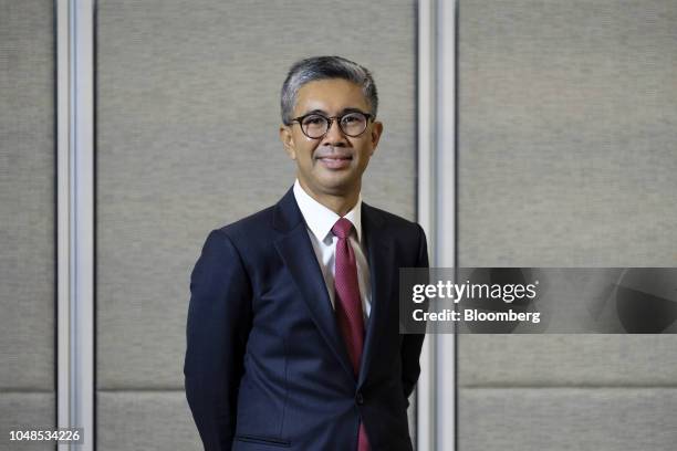 Tengku Zafrul Abdul Aziz, chief executive officer of CIMB Group Holdings Bhd., poses for a photograph after a Bloomberg Television interview at the...