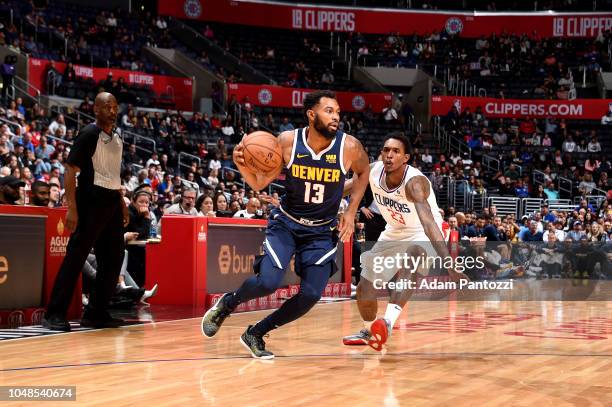 Xavier Silas of the Denver Nuggets handles the ball against the LA Clippers during a pre-season game on October 9, 2018 at Staples Center in Los...