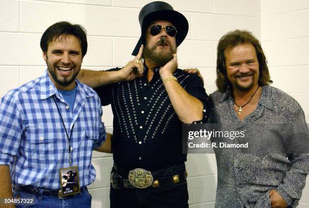 Mark Wills, Hank Williams Jr. And Travis Tritt during Hank Williams Jr. At The Arena at Gwinnett Center - September 20,2003 at Arena at Gwinnett...