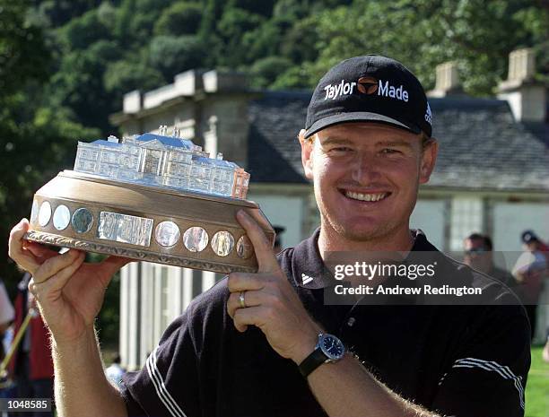 Ernie Els of South Africa poses with the trophy after winning the Standard Life Loch Lomond Tournament at Loch Lomond G.C, Glasgow, Scotland....