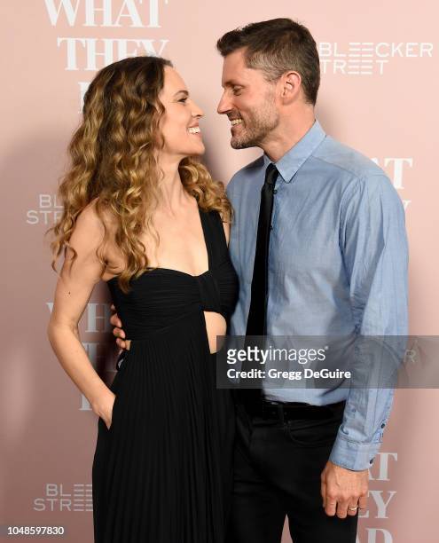 Actress Hilary Swank and husband Philip Schneider arrive at the Los Angeles Special Screening Of "What They Had" at iPic Westwood on October 9, 2018...