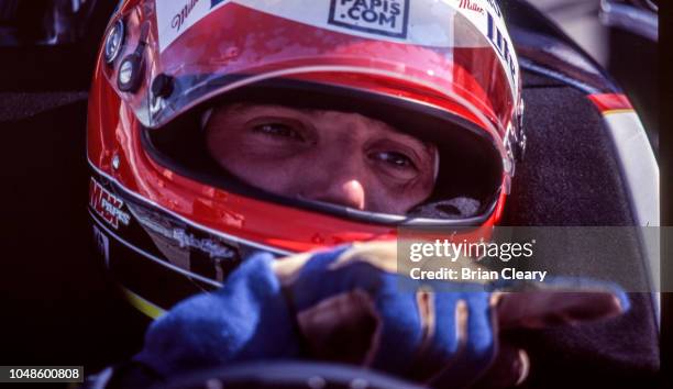 Max Papis of Italy sits in his car during the Marlboro Grand Prix of Miami, CART race, on March 26, 2000 in Homestead, Florida.