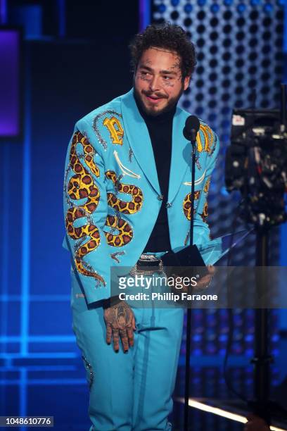 Post Malone accepts the Favorite Male Artist - Pop/Rock award onstage during the 2018 American Music Awards at Microsoft Theater on October 9, 2018...