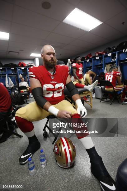 Erik Magnuson of the San Francisco 49ers gets ready in the locker room prior to the game against the Los Angeles Chargers at StubHub Center on...