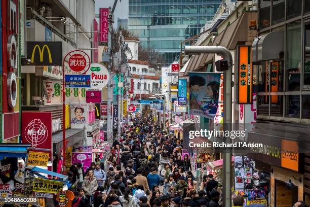 shoppers in takeshita street in harajuku - harajuku stock pictures, royalty-free photos & images