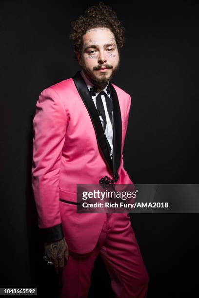 Post Malone poses for a portrait at the American Music Awards at Microsoft Theater on October 9, 2018 in Los Angeles, California.