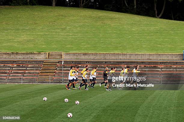 Players warm up during an Australian Socceroos training session at Leichhardt Oval on October 6, 2010 in Sydney, Australia.