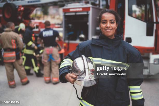 firefighter's portrait - emergency services stock pictures, royalty-free photos & images