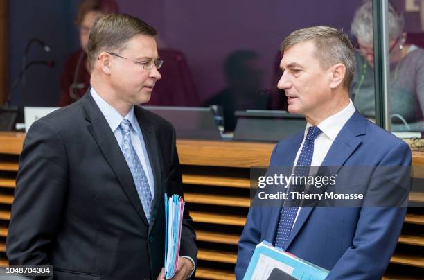 Euro & Social Dialogue Commissioner Valdis Dombrovskis is talking with the EU Digital Single Market Commissioner Andrus Ansip prior to the weekly...
