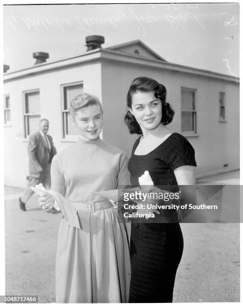 Contract approval. January 25 1957. Natalie Trundy;Joan Blackman.;Caption slip reads: 'Photographer: Mitchell. Date: . Reporter: Keating. Assignment:...