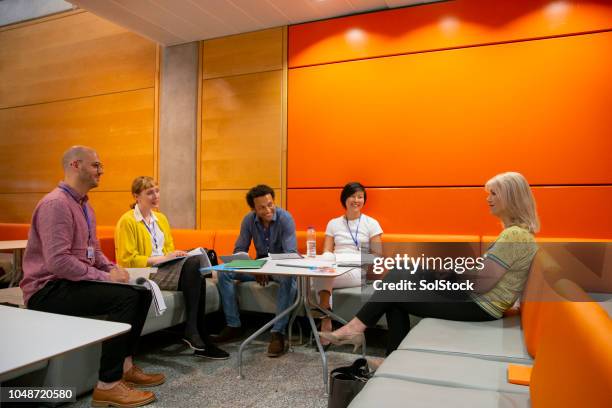 university tutor discussions - teacher meeting stock pictures, royalty-free photos & images