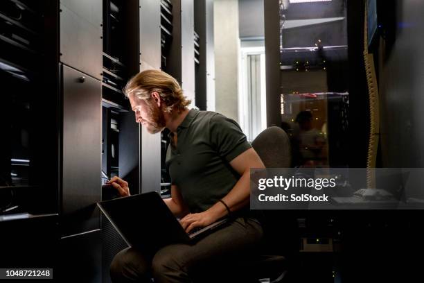 computer server technician at work - server room stock pictures, royalty-free photos & images