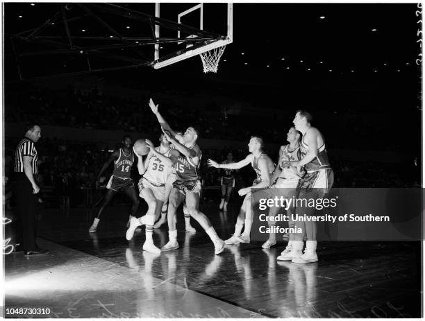 Basketball, Los Angeles Lakers versus Cincinnati Royals, 11 March 1961. Rod Hundley;Rudy La Russo;Elgin Baylor. .;Caption slip reads: 'Photographer:...