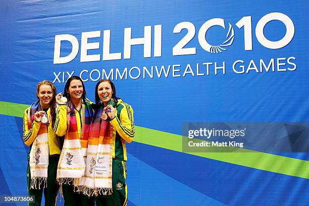 Medalists Tessa Wallace of Australia , Leisel Jones of Australia and Sarah Katsoulis of Australia pose during the medal ceremony for the Women's 200m...