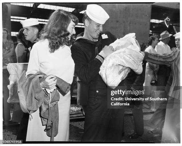 Arrival of USS Rochester, cruiser, San Pedro, 7 May 1952. Lieutenant Thomas Graham, United States Navy;Marilyn Graham;Mrs Frank Lorraine...