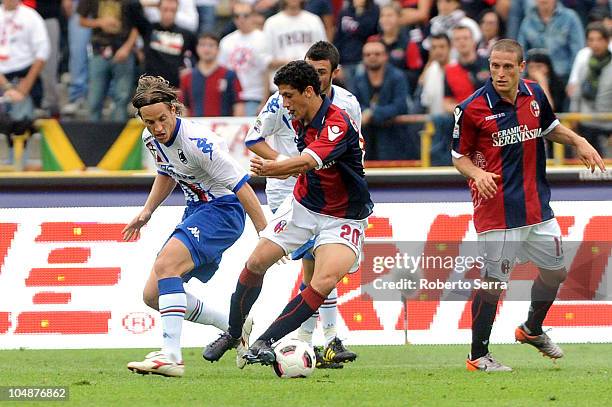 Henry Damian Gimenez of Bologna competes with Reto Ziegler of Sampdoria during the Serie A match between Bologna FC and UC Sampdoria at Stadio Renato...
