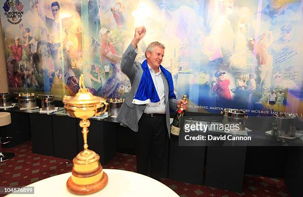 Europe Team Captain Colin Montgomerie in the team room with the Ryder Cup following Europe's victory in the 2010 Ryder Cup at the Celtic Manor Resort...