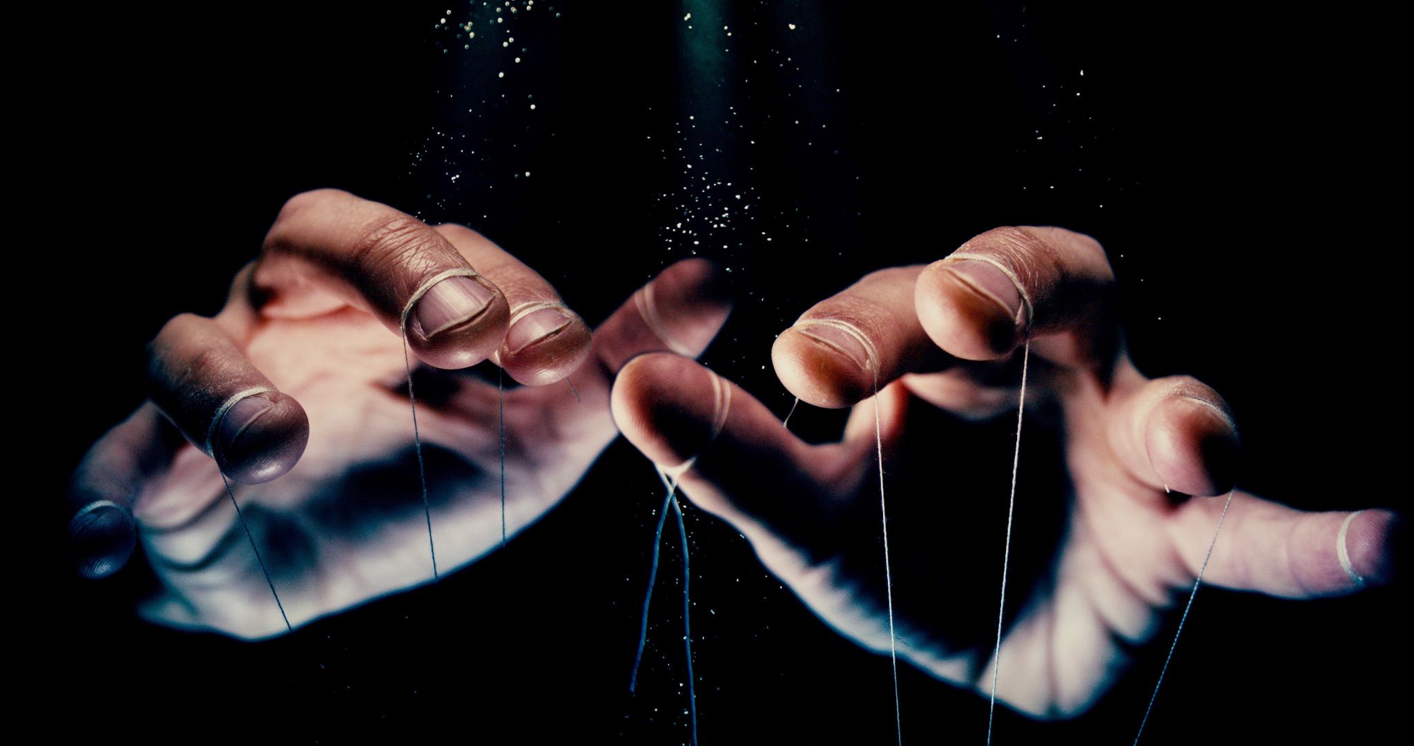 Puppet hands from leadership controlling our lives. Concept Puppet hands from leadership controlling our lives. Concept