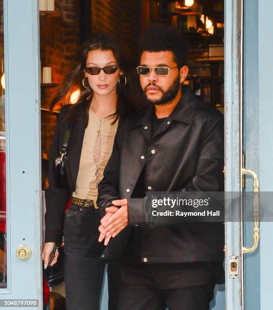 Model Bella Hadid and The Weeknd are seen on her birthday in Soho on October 9, 2018 in New York City.