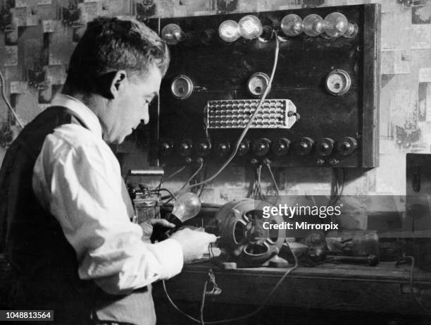 Making puns on his name is the occupation of Mr Alfred Sparkes. He's an electrical engineer at Collyhurst, Manchester. 11th October 1935.