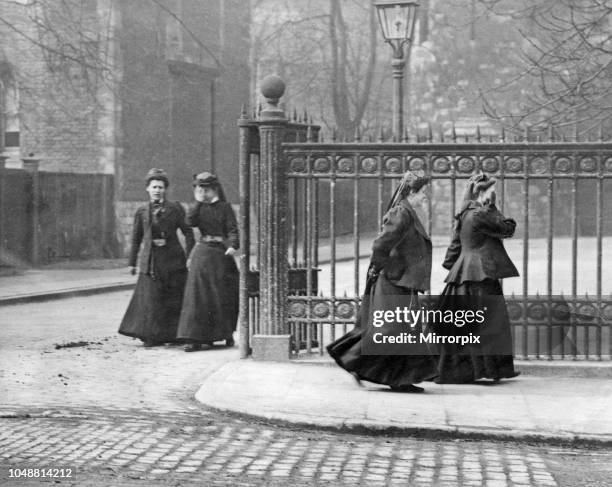 Wardenesses in charge of the suffragette prisoners seen here leaving Holloway Prison. 22nd March 1907.