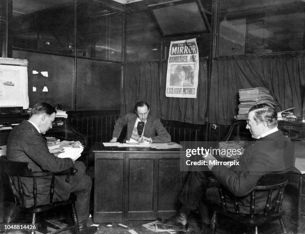 Daily Mirror, Bouverie Street, a consultation. Left to right, C Hosken, H Sanders and R Charlton. June 1922.
