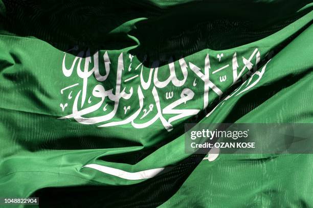 This picture shows a Saudi Arabian flag flying in Istanbul on October 10, 2018. - Jamal Khashoggi, a Saudi Washington Post contributor, vanished on...