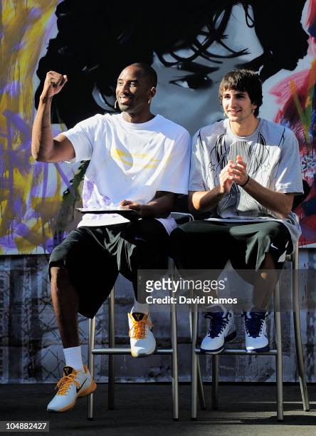 Kobe Bryant of the Los Angeles Lakers and Ricky Rubio of Regal FC Barcelona react during the 'House of Hoops' contest by Foot Locker on October 6,...
