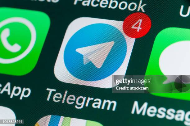 telegram, whatsapp, messages and other phone apps on iphone screen - telegram stock pictures, royalty-free photos & images