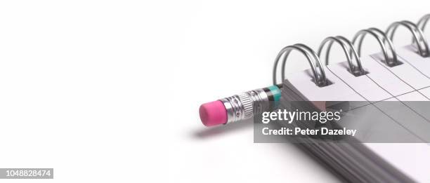 child's eraser on end of pencil in notepad - eraser on white stock pictures, royalty-free photos & images