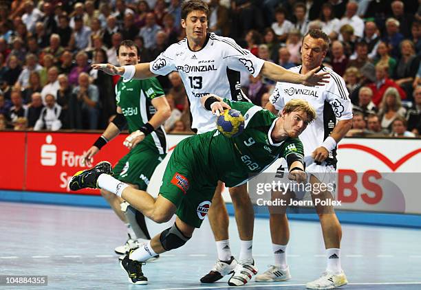 Manuel Spaeth of Goeppingen scores during the Toyota HBL match between THW Kiel and Goeppingen at the Sparkassen Arena on October 6, 2010 in Kiel,...