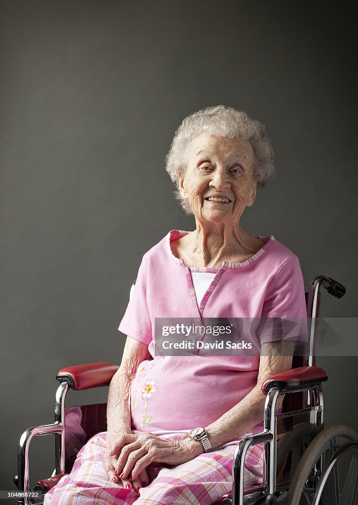 Portrait of senior woman in wheelchair