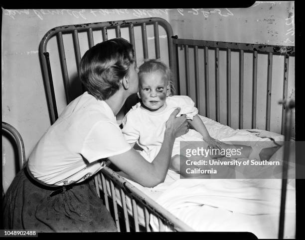 Baby beaten by ex-marine Girard J McNulty, 28 June 1957. Joyce Ellen Meyer - 2 years ;Irene Halfyard ;Lara Donnelly - 21 years .;Caption slip reads:...
