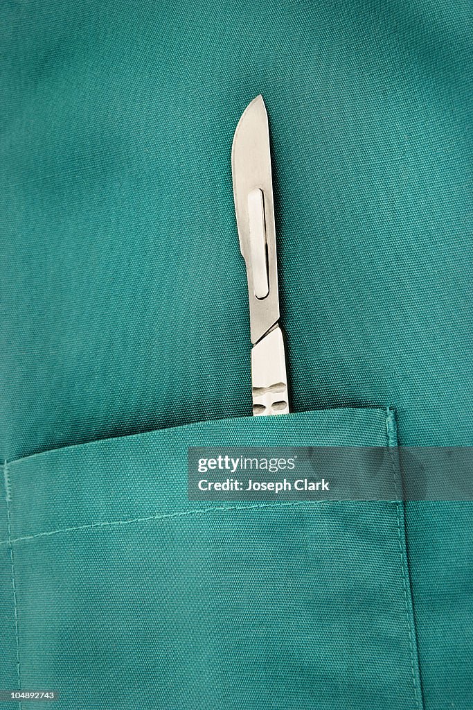 Scalpel in Doctor's Pocket