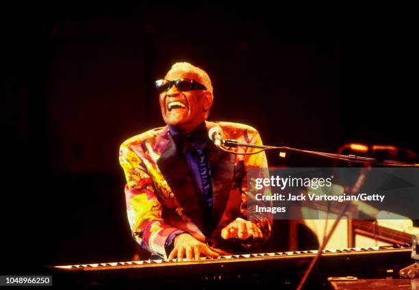 American R&B and Soul musician and band leader Ray Charles plays piano as he performs during a JVC Jazz Festival concert at Avery Fisher Hall at...