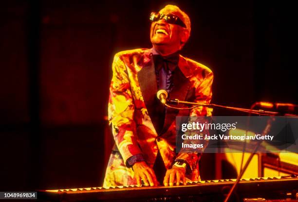 American R&B and Soul musician and band leader Ray Charles plays piano as he performs during a JVC Jazz Festival concert at Avery Fisher Hall at...