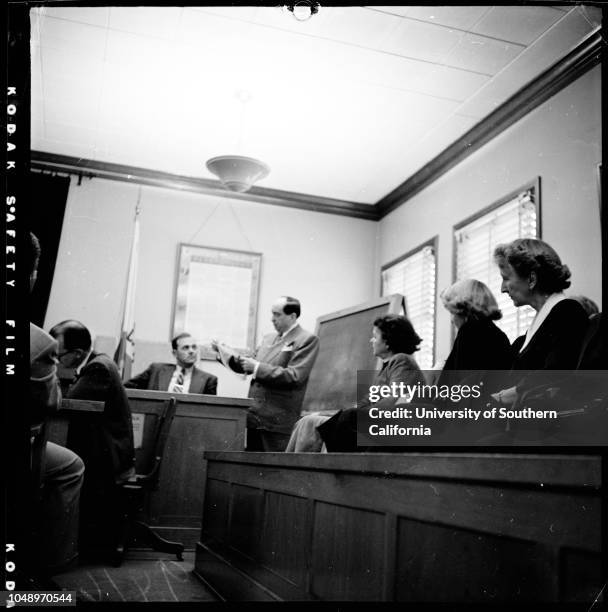 Lili Saint Cyr trial , 4 December 1951. Deputy C.H. Conner;Jerry Geisler;Lili Saint Cyr;Armando Orsini.;Caption slip reads: 'Photographer: Mercurio....