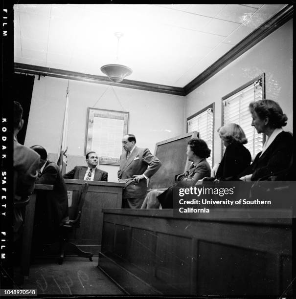 Lili Saint Cyr trial , 4 December 1951. Deputy C.H. Conner;Jerry Geisler;Lili Saint Cyr;Armando Orsini.;Caption slip reads: 'Photographer: Mercurio....