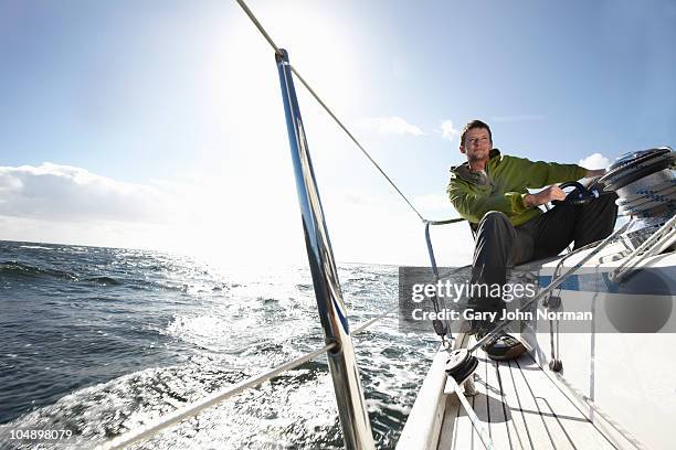 enjoying windy sailing conditions  - vela foto e immagini stock