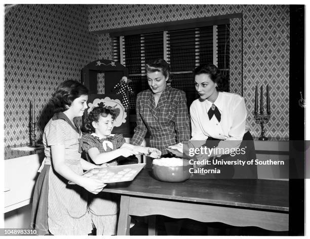 Junior auxiliary members cooking for girls' club of Assistance League party, 4 December 1951. Sharyn Jones, child, member of girls' club;Bonnie...