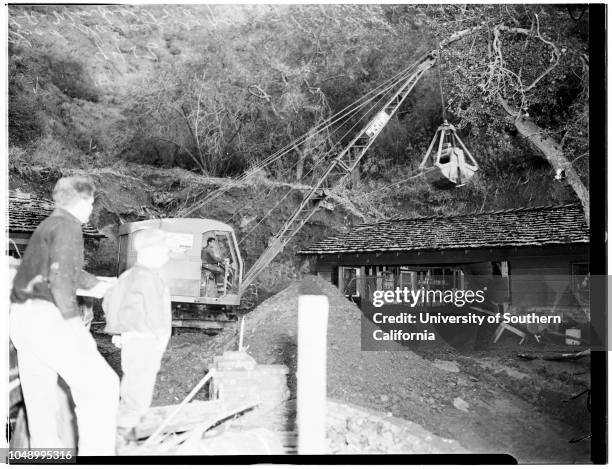 Flood damage repair at Benedict Canyon Drive damage at North Beverly Glen Boulevard, 19 January 1952. Home of Louis Wolf, 1551 North Beverly Glen...